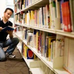 guy-with-library-books